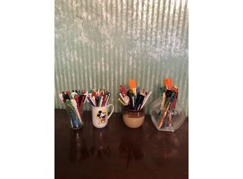 4 Containers Of Vintage Stirrers