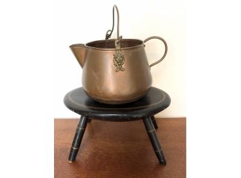 Old Copper Pot Lion Head Handles On Small Black Wood Stool - Pot Measures 10' X 5.5' - Stool Measures 11.5' X