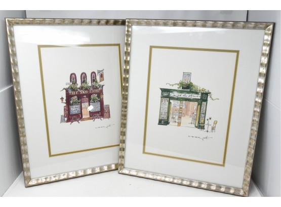 Two Framed Prints Of A Pub And A Café