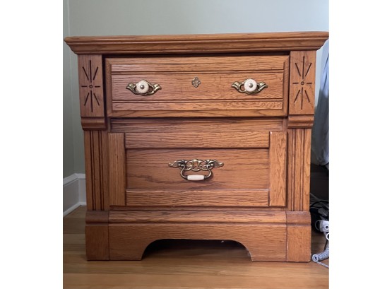 Wood Nightstand Carved With Porcelain Knobs And Handle