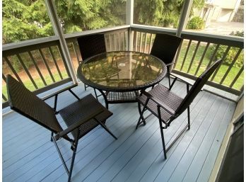 Brown Metal And Woven Plastic Outdoor Patio Table With 4 Folding Chairs..P47