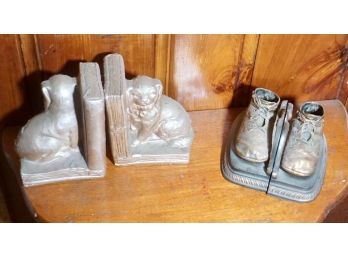 2 Pairs Of Bookends Plaster Cats & Brass Baby Boots