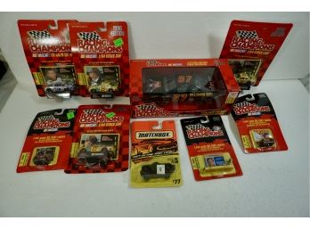 LOT OF 9 DIE CAST CARS INCLUDING 8 RACING CHAMPIONS AND 1 MATCHBOX