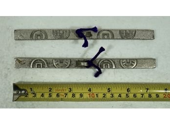 Two Iron  Scroll Weights