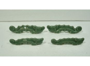 Four Celadon Scroll Weights 5' And 4'