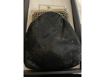 61. Black Shimmer Bag With Silvertone Closing. 8 1/2 Tall.