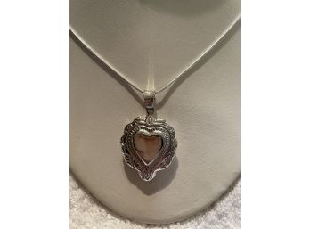 1. Sterling Heart Pendant With Rope Chain.