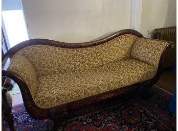 Antique Camelback Sofa With Inlaid Wood Frame And Carved Details