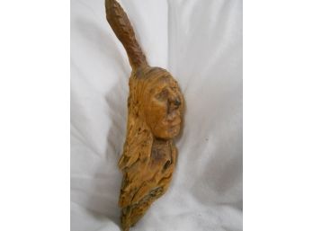 Carved Man With A Feather