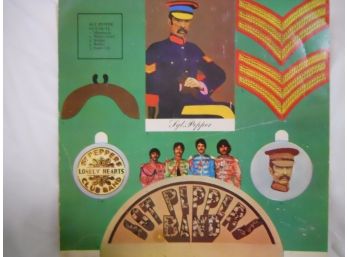 Sgt. Pepper Album Insert Of Cut Outs