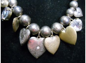 Vintage Heart Lockets Strung W/ Tapered Beads.