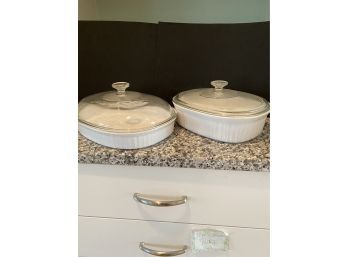 Two Covered Casserole Dishes 13 And 11