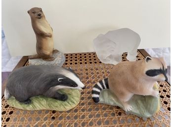 Four  Assorted Figurines Including Racoon