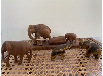 Four Wooden Elephant Figurines