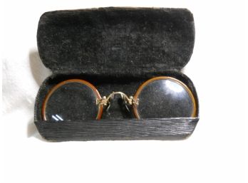 A Pair Of Spectacles And A Case
