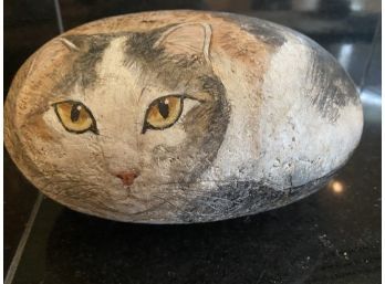 Large Painted Cat On Rock