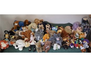 Approximately 38 Stuffed Animals/dolls Alf, Bart Simpson, Mickey & Minnie