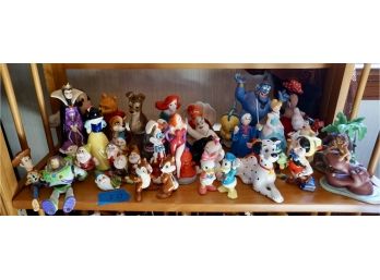 Shelf #20 Over 35 Dolls ( Disney)