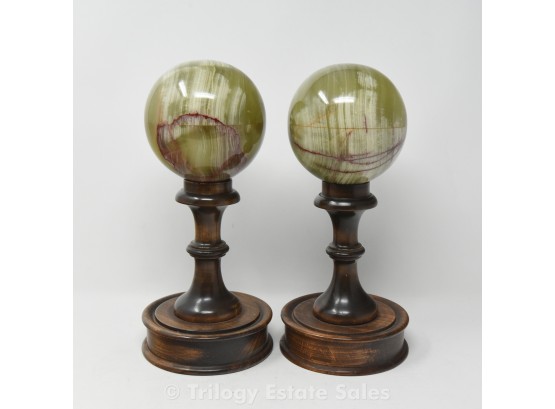 Pair Of Green Marble Spheres On Turned Wood Stands