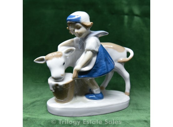 Girl With Calf Porcelain Figurine