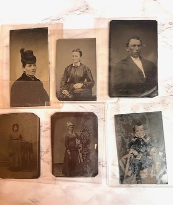 A Group Of 6 Individual Portrait Tintypes
