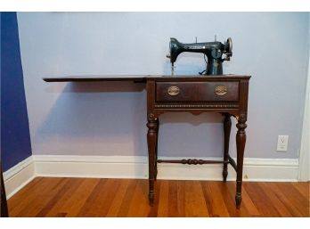 New Home NHSMCO, Antique Westinghouse Sewing Machine On Table
