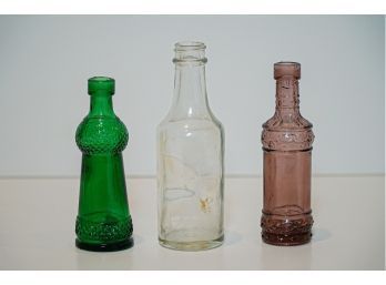 Lot Of Three Bottles ~ Green Clear And Brown/purple Embossed Glass!