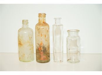 Group Of 4 Antique Bottles