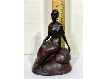 Carved Mahogany Sculpture Of Woman On A Rock