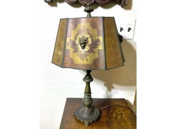 Antique Brass Lamp With Mica Shade And Lion Heads On Shade