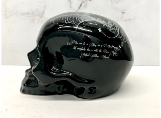 Black Ceramic Skull With Silver Bird On Top
