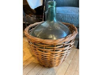 Vintage Wine Making Glass Jug In A Basket