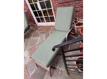 2 Lounge Chairs With Green Cushions