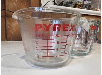 2 Pyrex Measuring Cups