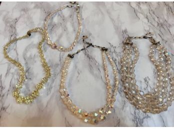 4 Austrian Crystals, Iridescent, And Colored Necklaces