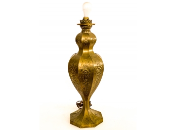 EMBOSSED FOOTED BRASS OIL LAMP WITH FLORAL DESIGN