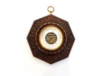 BRASS ENGLISH BAROMETER IN CARVED OCTAGONAL CASE
