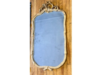 ANTIQUE CARVED AND GILT WALL MIRROR