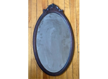 ANTIQUE MAHOGANY OVAL MIRROR W/ CARVED CREST