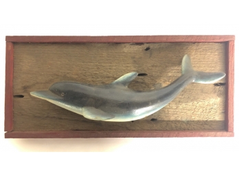 CARVED WOODEN DOLPHIN ON BOARD