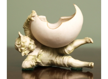 BISQUE CURIO Of An IMP With An EGGSHELL
