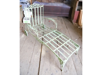PAIR OF WROUGHT IRON CHAISE LOUNGES (1) PHOTOGRAPHED IN LEAD