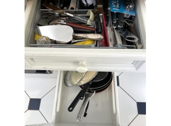 CONTENTS OF THE LOWER KITCHEN DRAWERS/CUPBOARDS