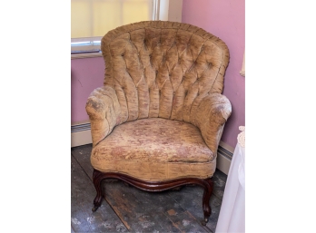 VICTORIAN UPHOLSTERED ARMCHAIR ON CASTERS