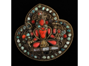 ASIAN CORAL BROOCH DEPICTING A DIETY