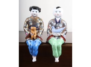 PAIR OF (20th c) CHINESE PORCELAIN PIANO BABIES