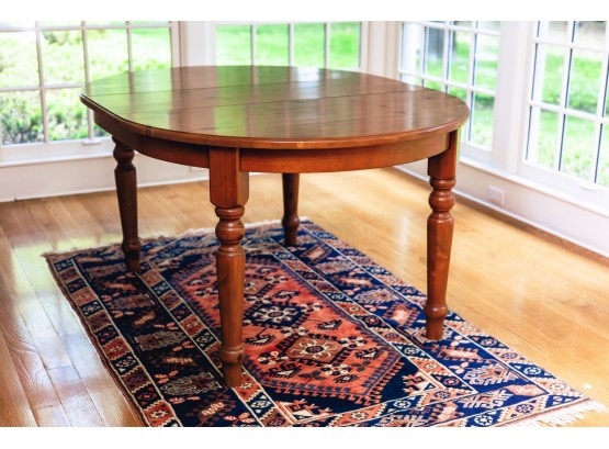 HSIEN YANG OVAL HARDWOOD DINING TABLE