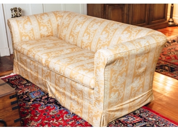 UPHOLSTERED SOFA with TAPERED MAHOGANY LEGS
