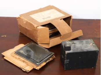 ANTIQUE CAMERA and a GROUPING OF GLASS PLATE NEGS.