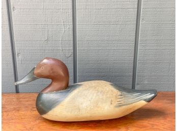SIGNED 'S' CARVED AND PAINTED CANVASBACK DECOY